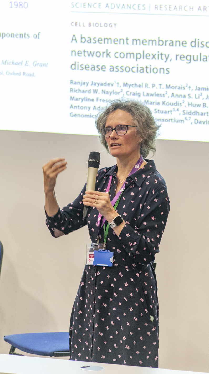 Professor Rachel Lennon in a lecture theatre giving a talk.