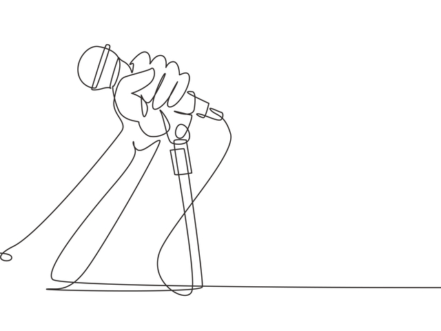 a hand holding a microphone