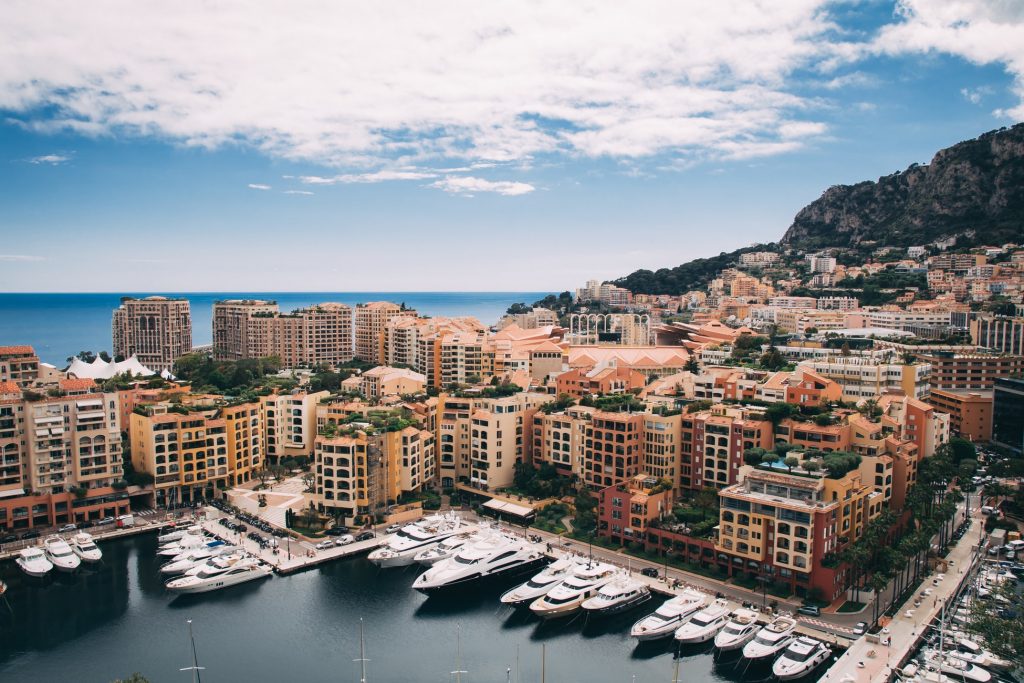Superyachts berthed under the towers of Monte Carlo