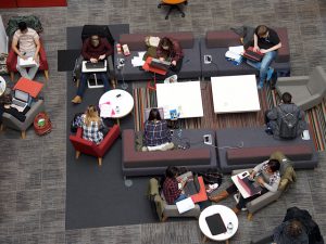 Students in a study space - photograph taken from above