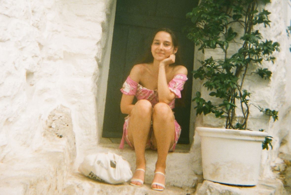 Iva sitting on steps