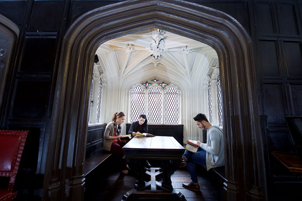 Students study together at Chetham's Library at The University of Manchester