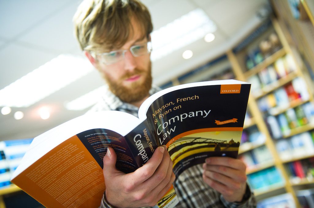 Student reading a Law Book