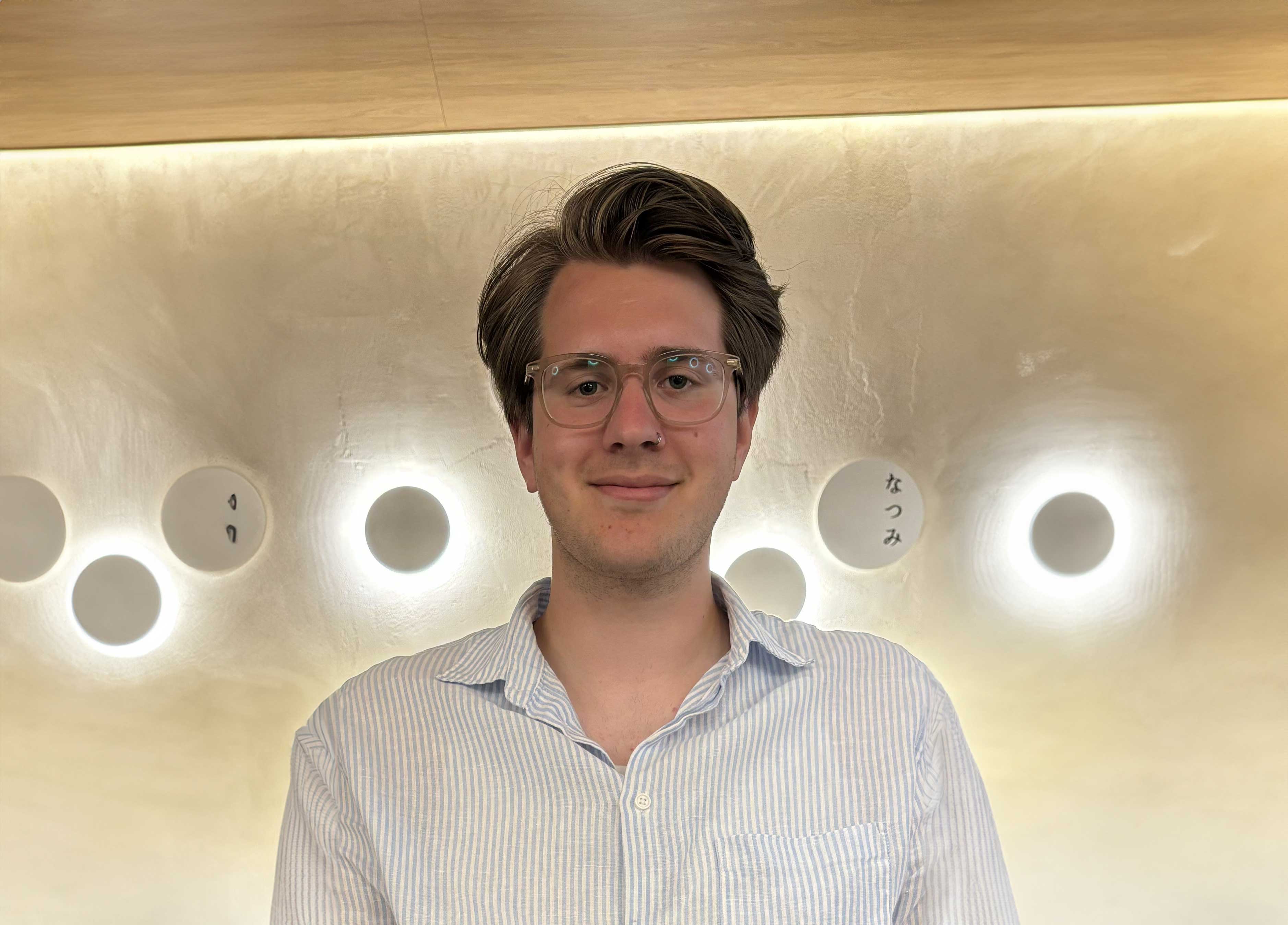 photo of a male student smiling