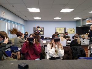 Students using VR headsets in class