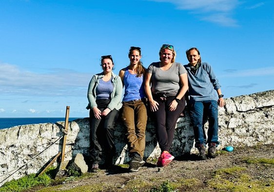 Photo of Professor Kathryn Else, Dr Iris Mair, Dr Rowan Bancroft and Prof Amy Pedersen on the Isle of May carrying out work on a three year BBSRC project working with wild house mouse population