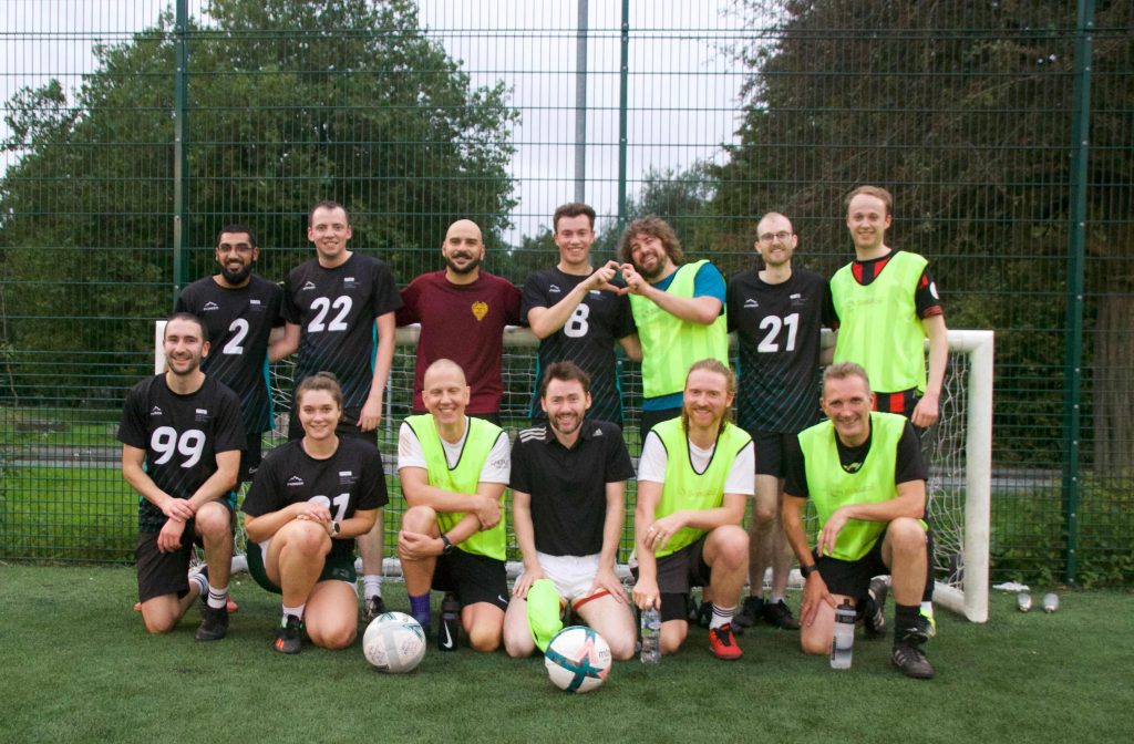 Photo of Lydia Becker Institute PI and Postdoc vs PhD Student Football Teams