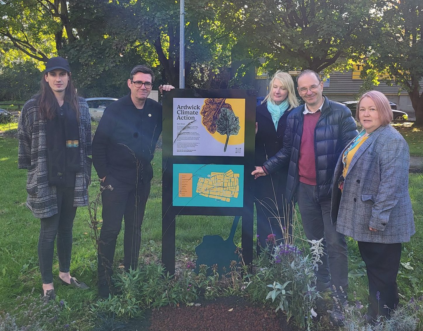 On October 3rd 2024 Manchester Mayor Andy Burnham vists Ardwick Green Route site on Kale Street created by partnership between Ardwick Climate Action and researchers from the Lydia Becker Institute