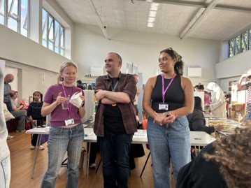 Three colleagues at the fair.