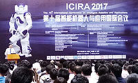 Big screen and attendees in the main hall at 10th International Conference on Intelligent Robotics and Applications (ICIRA 2017)