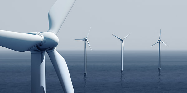 3d rendering of windturbines on the ocean