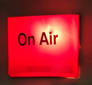 'On Air' light sign in the Crescent Community Radio studio