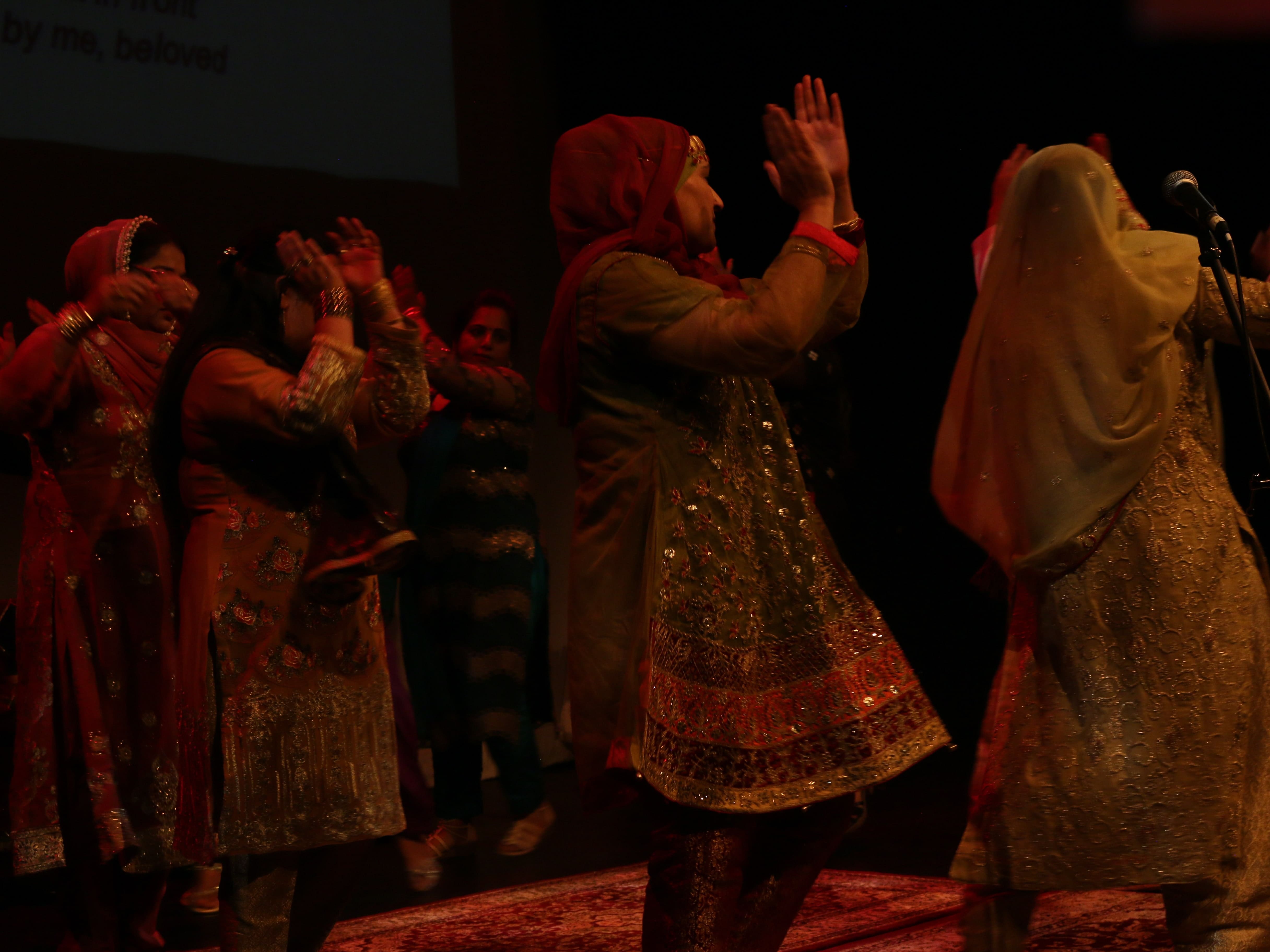 Mehndi ceremony Ensemble of women reenacting a scene of traditional singing and dancing (Mehndi), common before the wedding day in South Asian culture. The Mehndi ceremony represents the bond of matrimony and signifies the love and affection between the couple and their families.