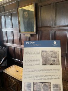 Museum information point on Dr Dee at Chethams. Text in picture is too far away to read.